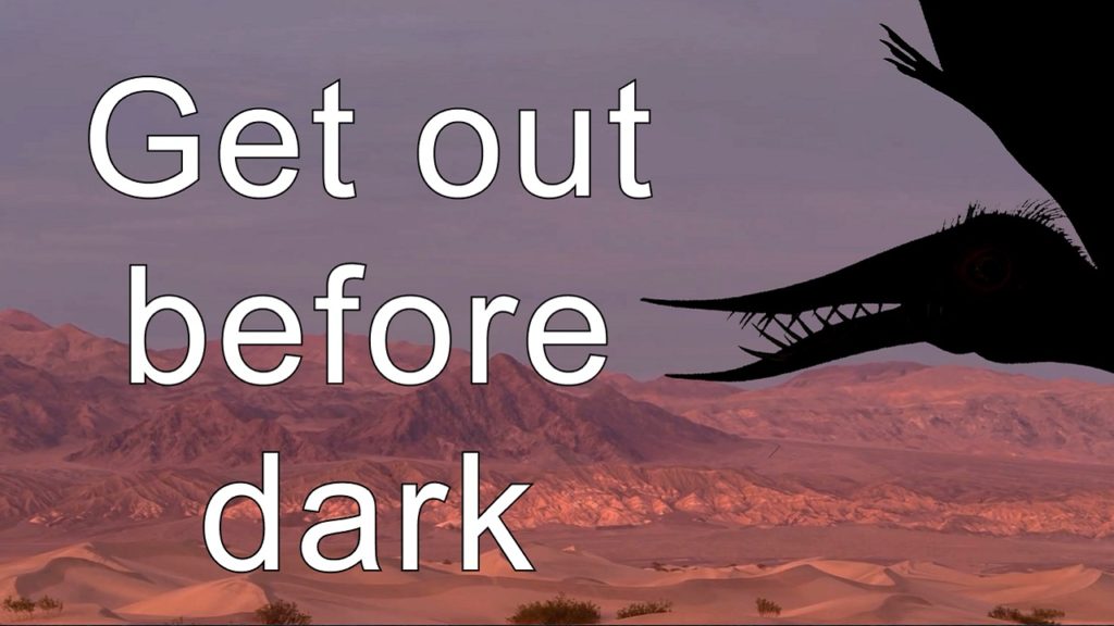 pterodactyl head in a California desert with "Get out before dark"